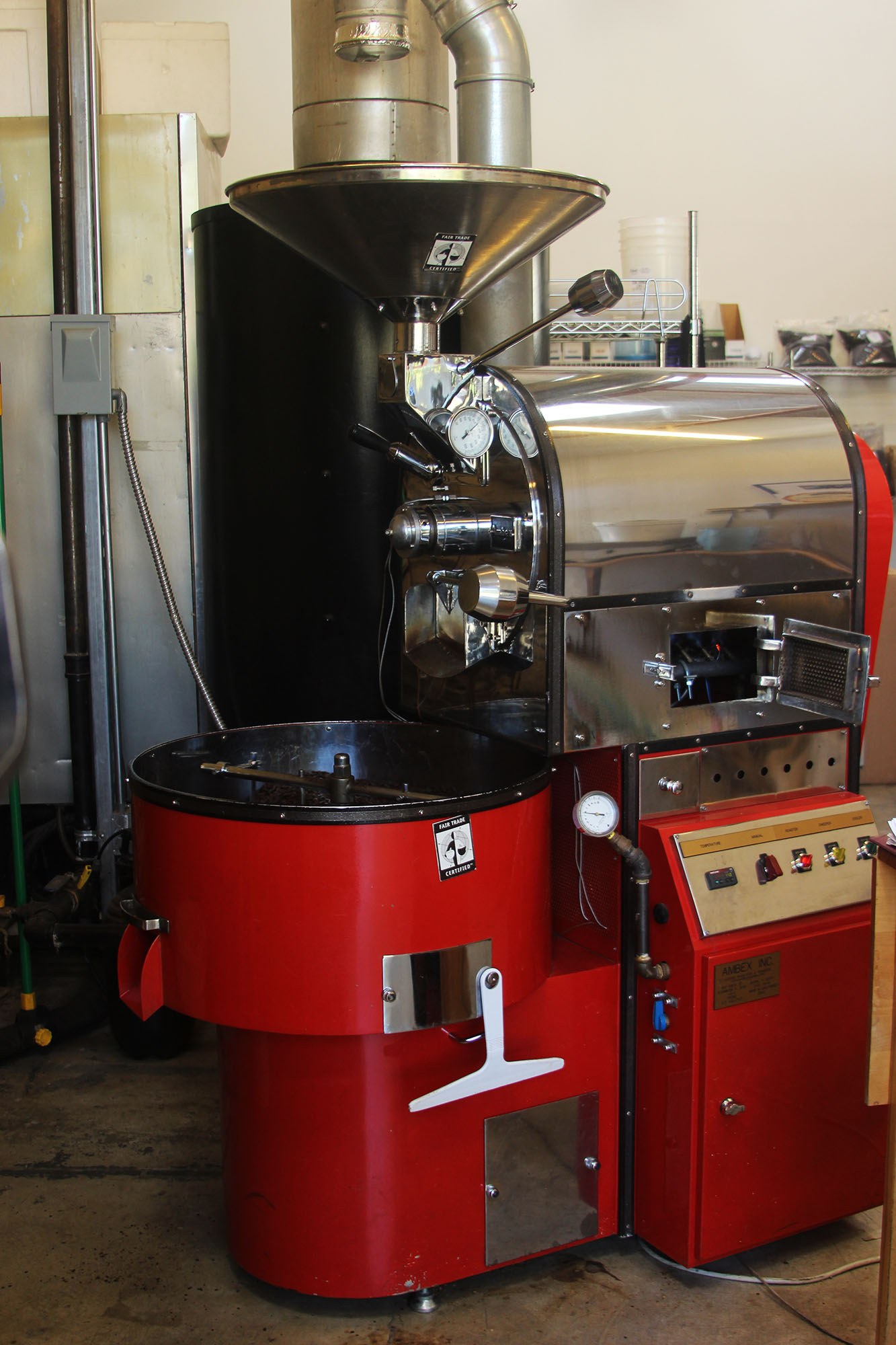The red enamel roasting machine at Joebella coffee.