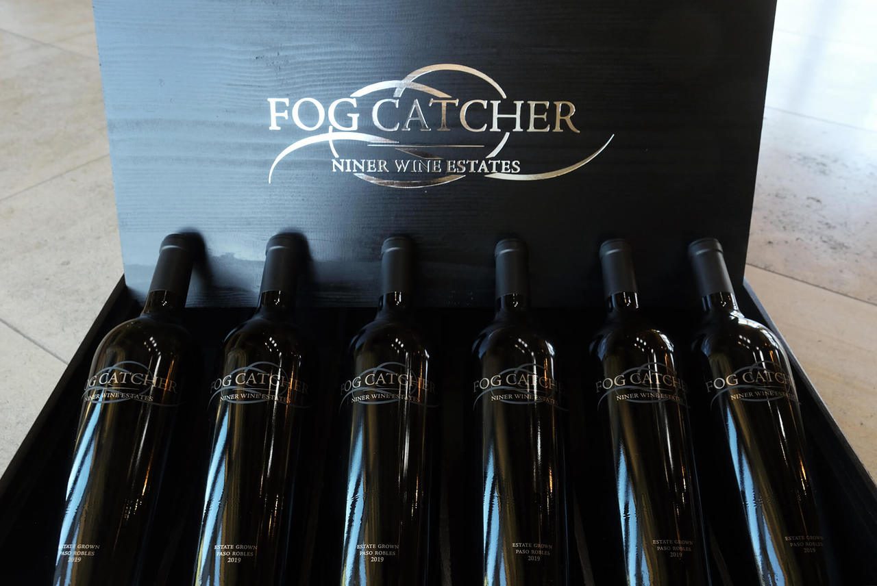 6 bottles of Fog Catcher in a wooden box